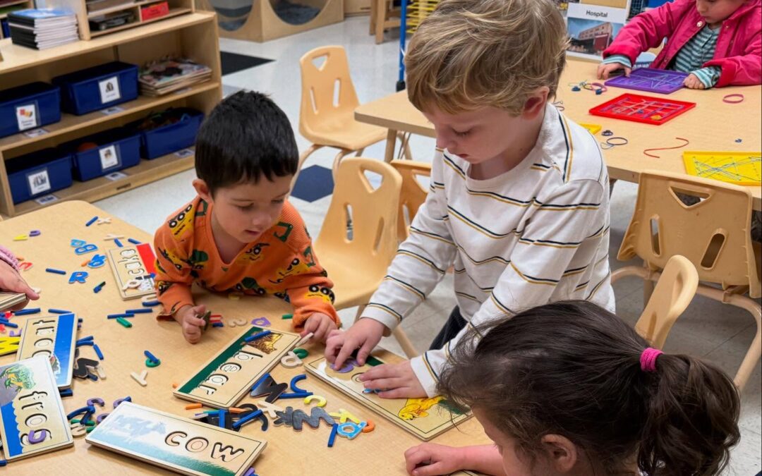 Children playing at preschool with toys
