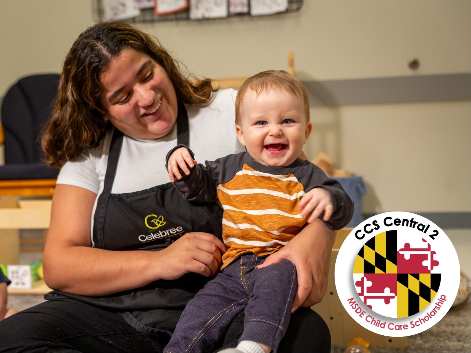 Teacher and Infant with MD Scholarship Logo