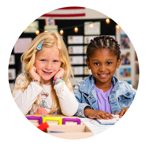 Pre-K student reading in a Celebree School classroom.
