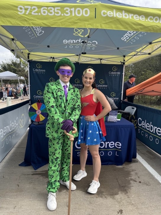 Ryan and Krysta Snitzer at a Celebree Booth dressed up for Halloween