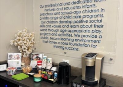 Celebree mission statement on a clear plaque over a coffee station.