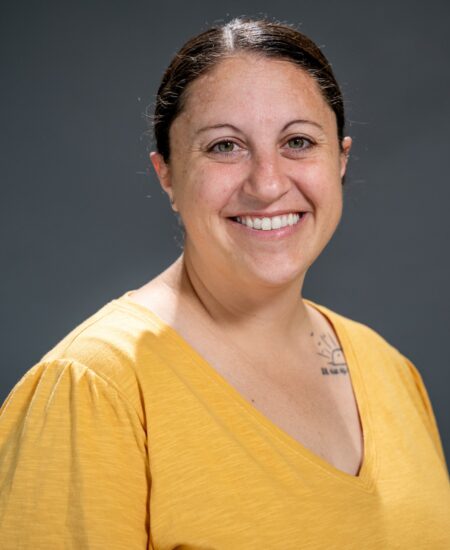 Young woman in a yellow shirt 