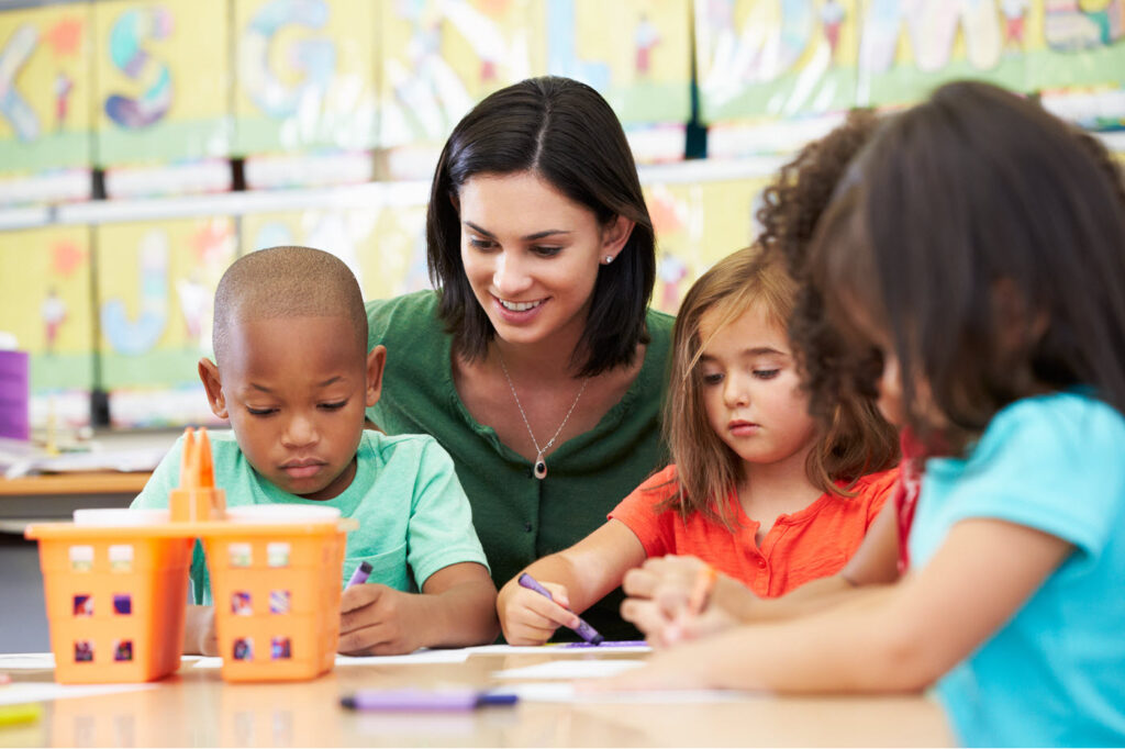 Celebree teacher with children at child care in Ferndale.