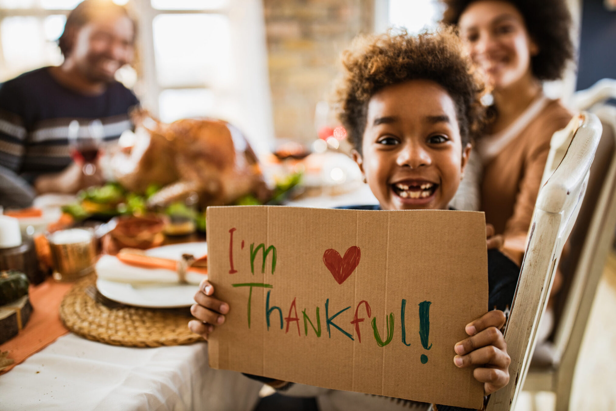 child is thankful on thanksgiving